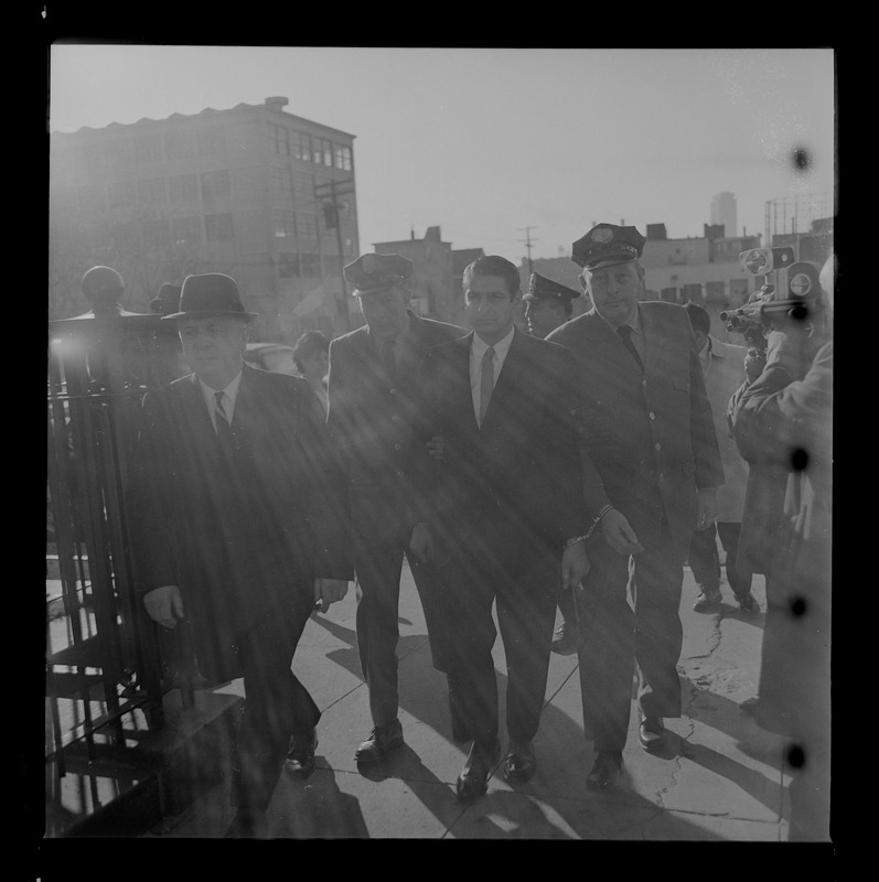 Officers walking with Albert DeSalvo