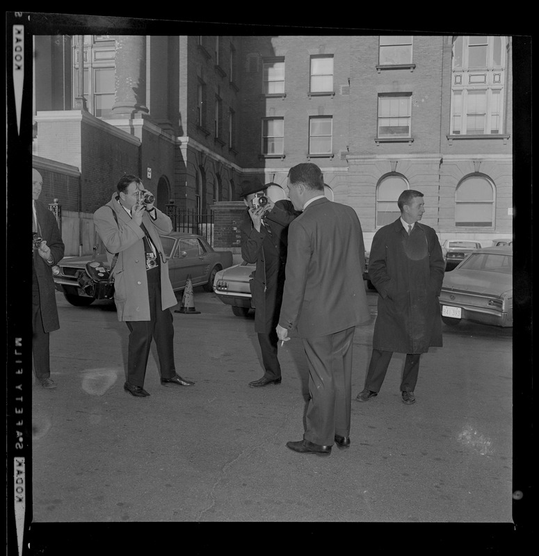 Attorney F. Lee Bailey has photo taken by another outside the courthouse