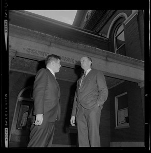 Assistant District Attorney Donald Conn and forensic psychiatrist Dr. Ames Robey in discussion in front of the courthouse