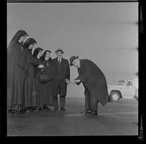 Jimmy Durante, the Schnozzola with Columbian Sisters and Middlesex Sheriff Howard W. Fitzpatrick, who met him at airport before his appearance last night at Columbian benefit at Garden