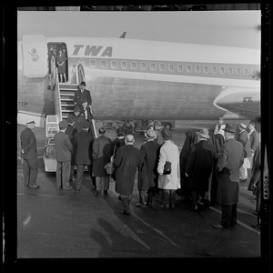 Jimmy Durante walking down the TWA airplane steps