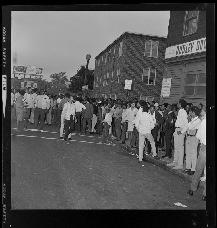 Group gathered in front of Dudley Door Window and Lumber Co.