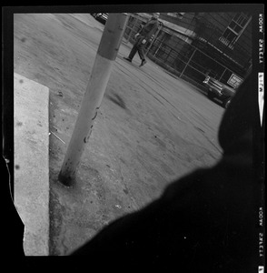 Shot of base of a pole on street
