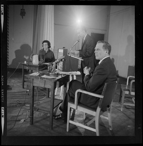 Kevin White and Louise Day Hicks both seated during the debate