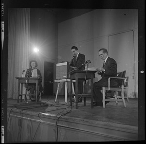 Kevin White and Louise Day Hicks seated during the debate