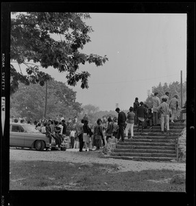 Spectators standing on rock stairs in Franklin Park
