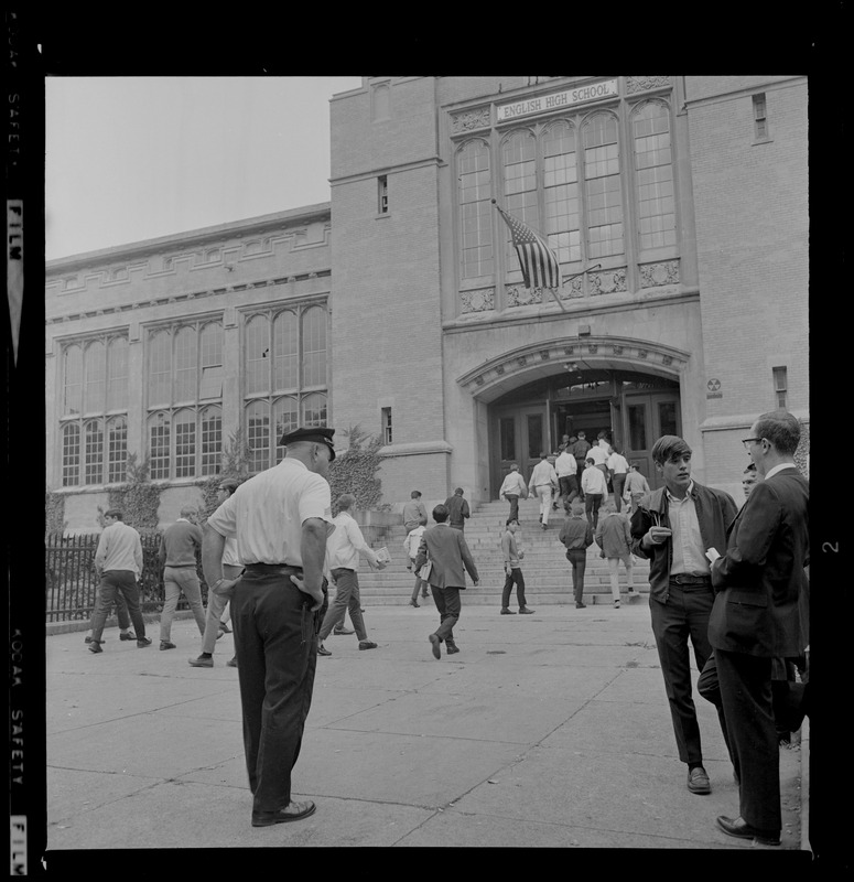 Students walking in to English High School