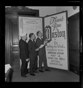 Mayor Kevin White with two members of the American Legion looking at the sign for the 49th National Convention