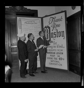 Mayor Kevin White with two members of the American Legion looking at the sign for the 49th National Convention