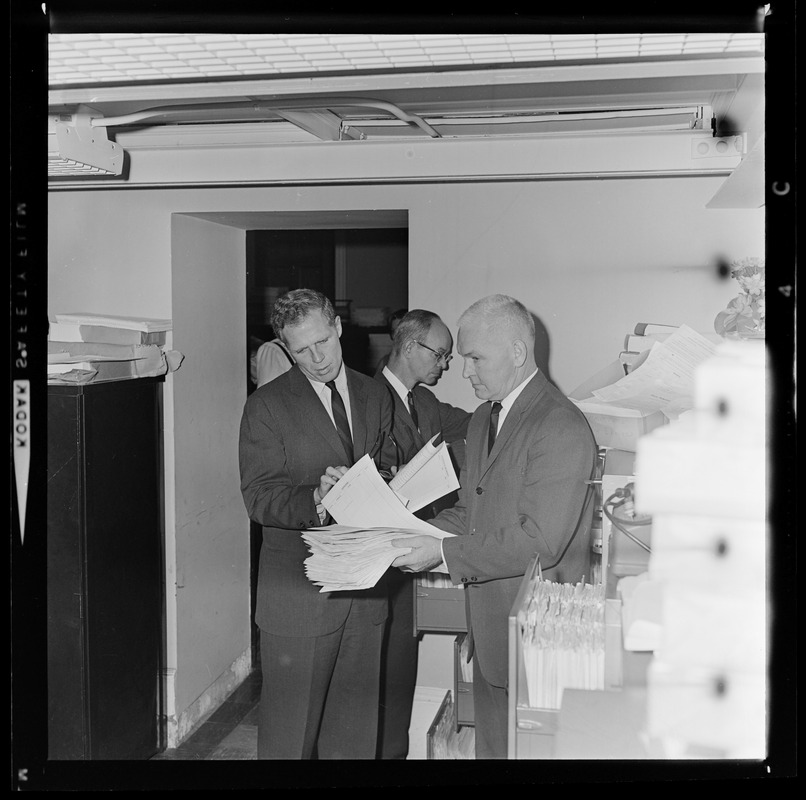 Secretary of State Kevin H. White, center, with Norman Gleason, left