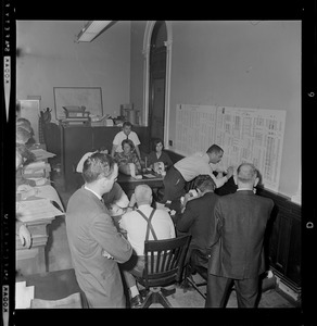 Members of Secretary of State's office complete a hectic day of recounting