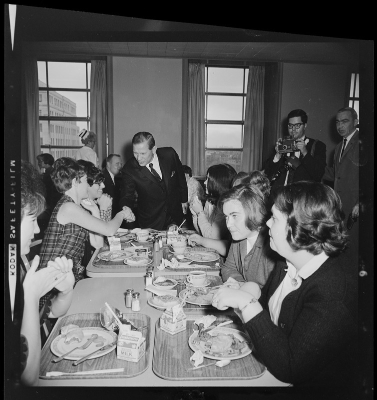 Governor John A. Volpe moves throughout a cafeteria greeting diners