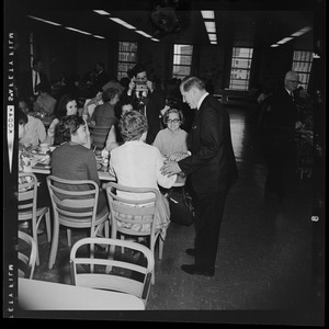 Governor John A. Volpe moves throughout a cafeteria greeting diners