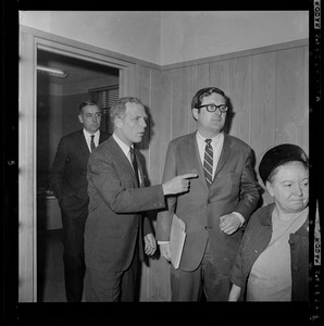 Mayor Kevin White points out something to his Press Secretary, Richard Flavin, as they leave the Maurice Tobin Memorial Building