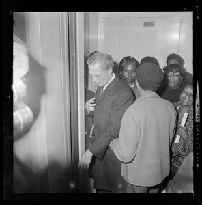 Mayor Kevin White leaving an elevator