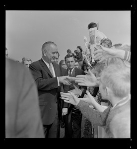 President Johnson greets fans at Worcester airport