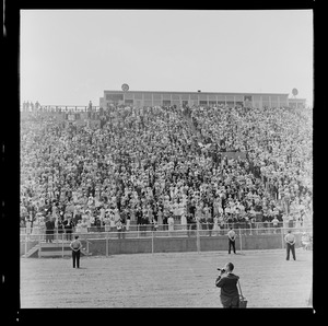 Crowds in the stands during commencement ceremony at Holy Cross College