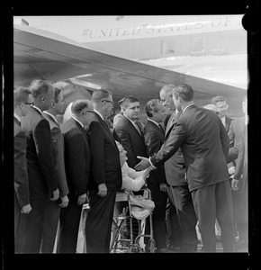 Governor Peabody introducing President Johnson to others at airport