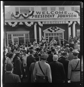 President Johnson moves through the crowd at Worcester Airport
