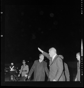 President Johnson waves to supporters off camera