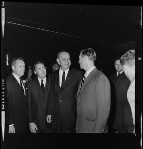 President Johnson talking with Governor Peabody while Massachusetts State Treasurer Robert Crane, far left and one other looks on