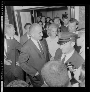 President Johnson walking out of N.E. Baptist Hospital, with Joan Kennedy at his side