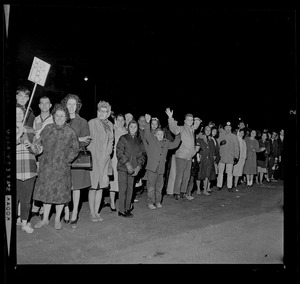 Fans line up to welcome President Johnson