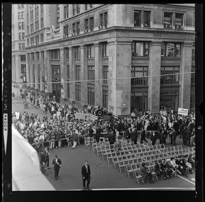 Chairs set up and spectators gathering in Post Office Square for President Johnson's arrival