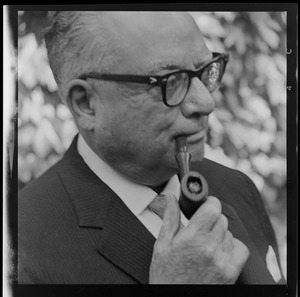 Rómulo Betancourt, former President of Venezuela, smoking a pipe