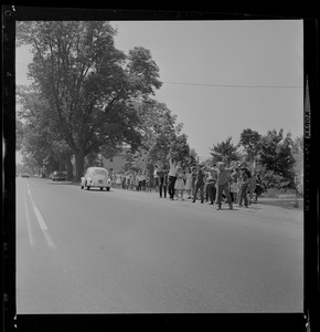 People gathered on the street waiting for Gemini 9 to pass