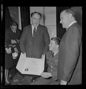 Massachusetts Secretary of the Commonwealth, John F. X. Davoren and another man giving a Secretary's Citation to wounded Vietnam vet Collins
