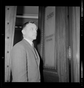 Representative H. Thomas Colo leaving the Speaker's Room