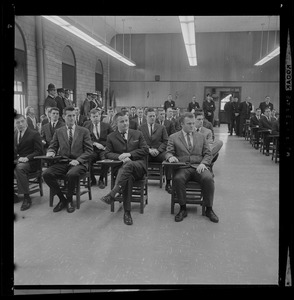 Seated Boston Police Academy graduates