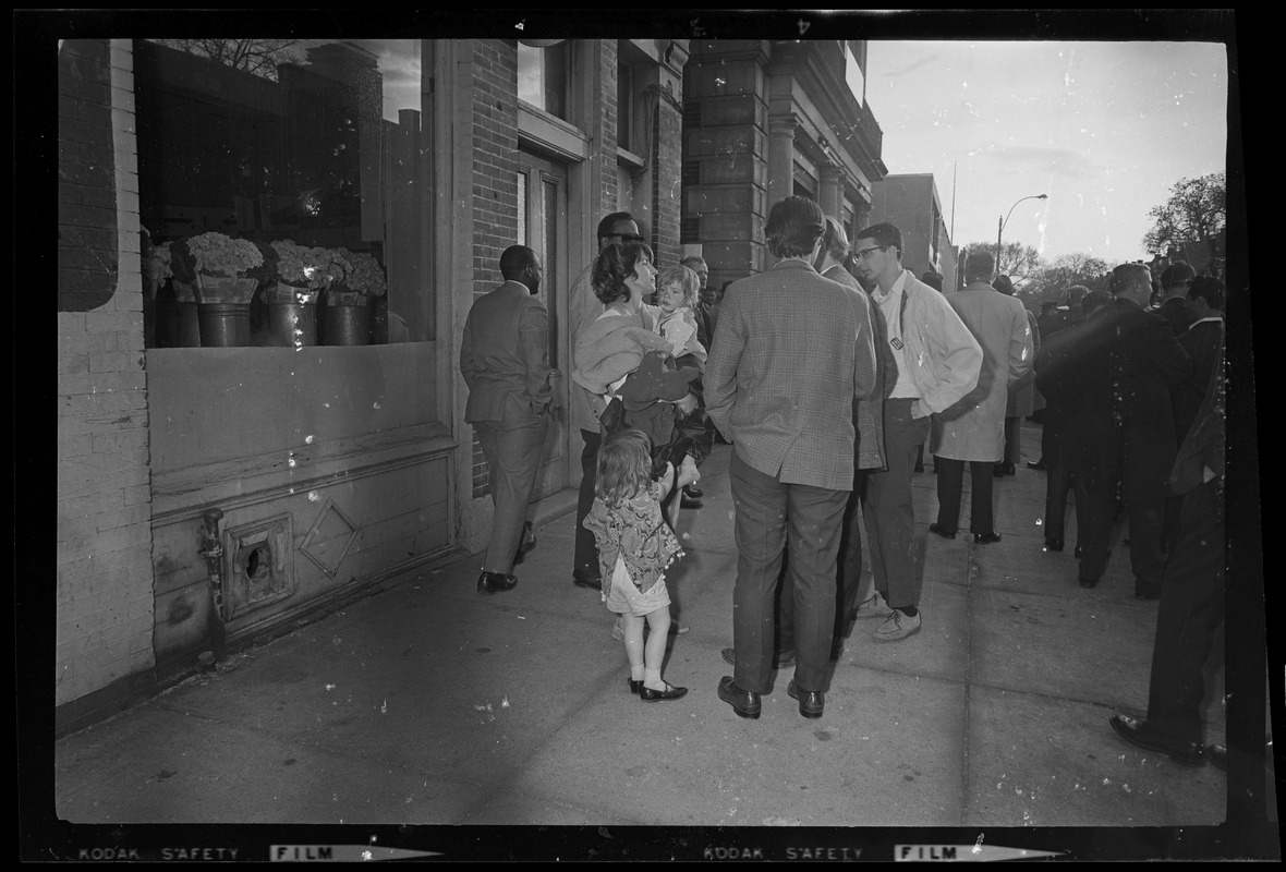 Group of people outside of the floral shop near the Boston Redevelopment Agency in the South End