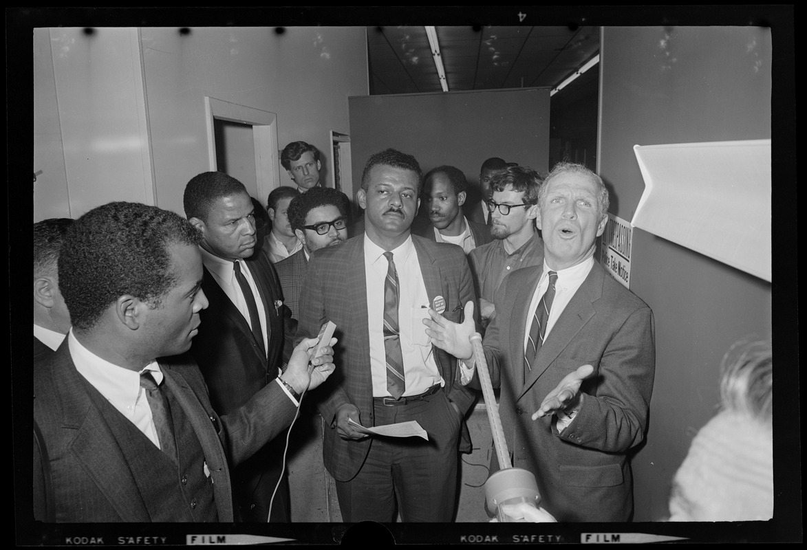 Mayor White talking to a three other men