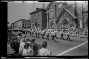 Procession going by a church during the Bunker Hill Day parade
