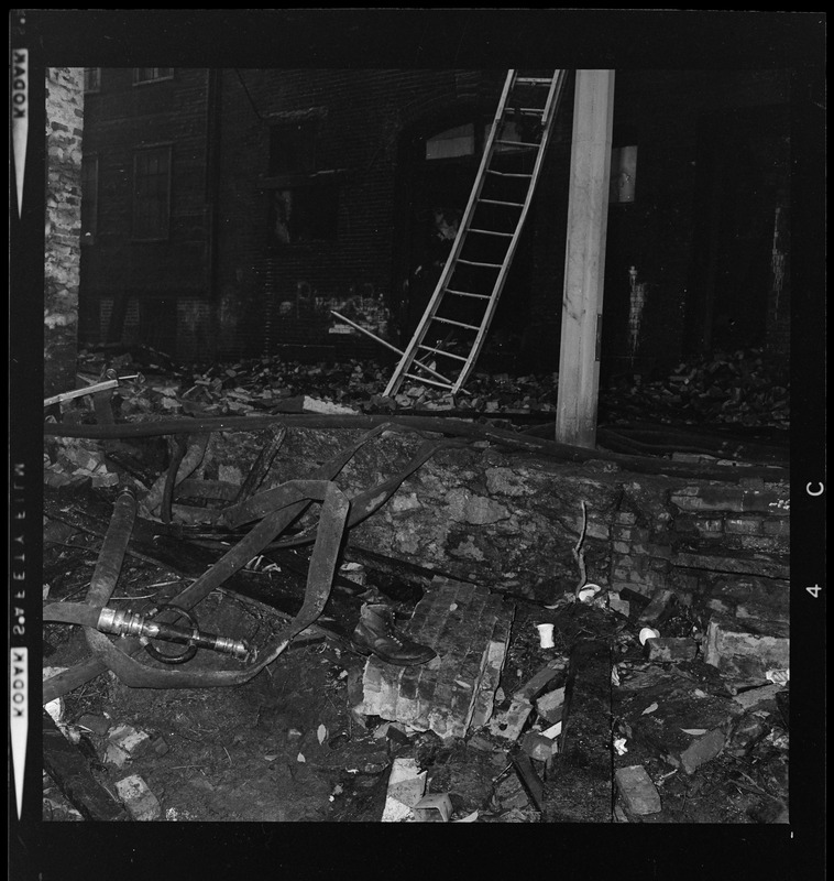 Debris after the fire caused a building to collapse