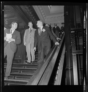 Men walking down stairs