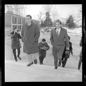 Morris B. Abram, right, President of Brandeis University and another man, walking up stairs
