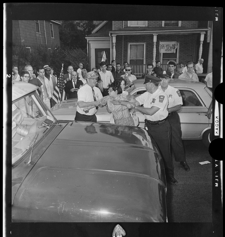 Resident in a scuffle with police officers