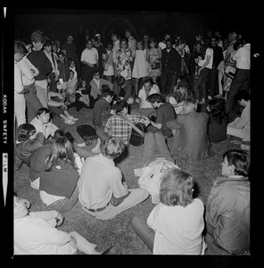 Large seated group on the grass, most likely in Boston Common