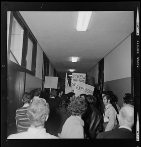 Student protesters in the halls of MIT with signs