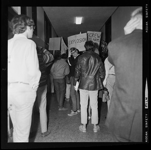 Student protesters in the halls of MIT with signs