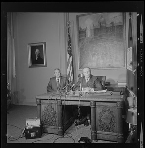 Fire Comr. James H. Kelly with Mayor White as White speaks to newsmen during picketing by firefighters