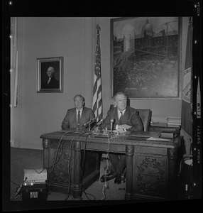 Fire Comr. James H. Kelly with Mayor White as White speaks to newsmen during picketing by firefighters