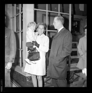 Mayor and Kathryn White with their son Christopher wait in line to vote at Charles Street Meeting House, Beacon Hill