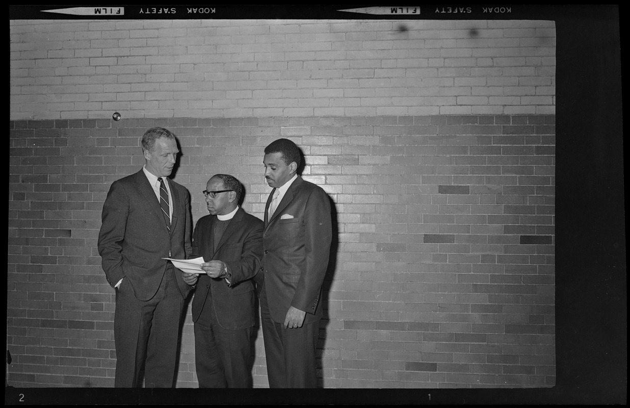 Conference on employment, presided over by Rev. Vernon Carter (center) confers with Boston Mayor Kevin White and Bertram Lee, Director, Opportunities Industrialization Center