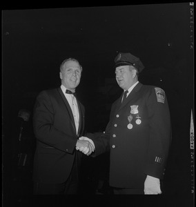 Mayor-Elect Kevin White shaking hands with Walter Scott Medal of Honor recipient, Ptl. Edward J. Phelan