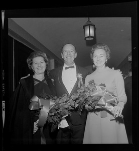 A man and two women guests at the Policemen's Ball