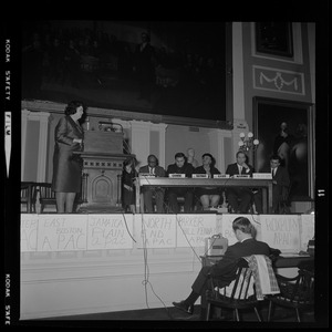 Louise Day Hicks at the podium as the panel asks questions